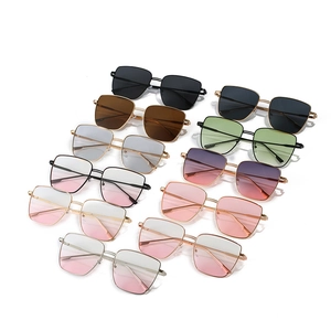 Collection of oversized square metal sunglasses in various gradient and solid colors