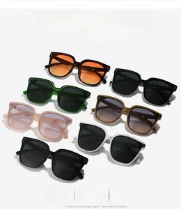 Detailed grid of fashion square sunglasses in seven assorted colors with metal rivet accents