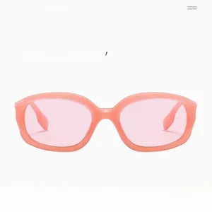 Detail of pink transparent frame sunglasses featuring HD lenses and sporty tech design