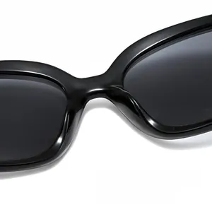 Close-up of integrated nose pads on black futuristic sunglasses with sleek frame