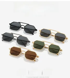 Macro detail of geometric metal sunglasses showing dual bridges and colorful lenses