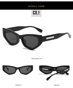 Detailed view of black cat-eye sunglasses with thick frames and silver metal temple accents