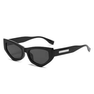 Retro geometric cat eye sunglasses in glossy black with silver metal temple accents
