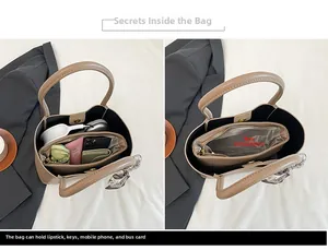 Spacious interior of khaki leather tote bag showing zipped main pocket and daily essentials