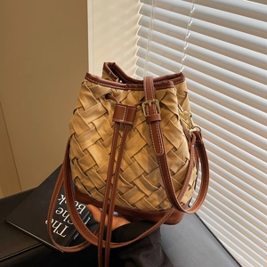 Chic khaki woven bucket bag with suede leather trim and drawstring closure for women