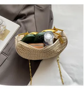 Spacious interior of beige woven crossbody bag showing phone and wallet storage