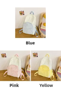 Three variants of the sweet school backpack in blue, pink and yellow with polka dot bow