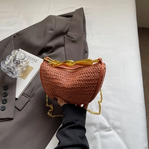 Brown woven crescent handbag with artistic gold metal handle and chain shoulder strap