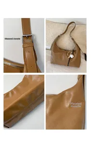 Detail view of caramel brown PU leather tote bag with rhinestone buckle and pleated handle