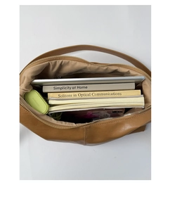 Top view of brown leather tote bag showing large capacity for tablet and books