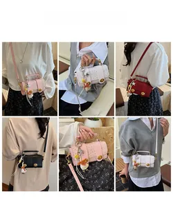 Detailed views of mini crossbody bags with ostrich texture and gold duckling charms