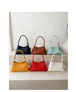 Detail of multi-colored woven shoulder bags displayed on marble steps in six elegant colors