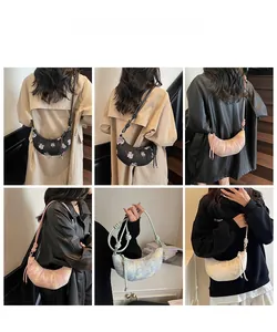 Detailed model showcase of embroidered crescent shoulder bags in multiple vibrant colors