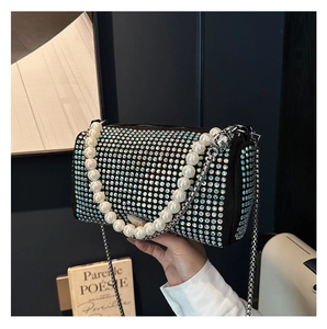 Sparkling black rhinestone cylinder handbag with pearl handle and silver chain strap