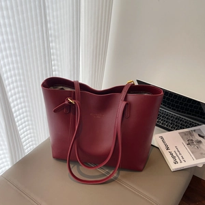 Large burgundy leather tote bag with Fashion & Bags lettering for women commuting