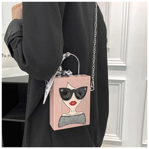 Pink box bag with pop art portrait, rhinestone details and silk scarf wrapped handle