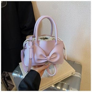 Chic lavender bow handbag with drawstring liner, versatile shoulder and crossbody bag for women