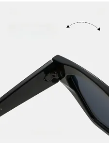 Detail of a durable metal hinge on retro black cat eye sunglasses with high texture