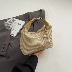 Chic woven shoulder bag with ginger leather handles and decorative pearls for summer