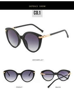 Three views of cat-eye sunglasses with black frames, gradient lenses and gold metal accents