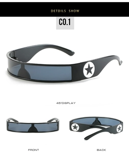 Detail view of futuristic Y2K sunglasses with black wrap frame and star logo on the temple