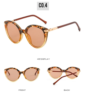 Three angles of women's cat eye sunglasses with tortoiseshell frames and golden metal hinges