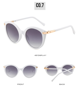 Three-angle view of white cat-eye sunglasses with gradient lenses and gold temple detail