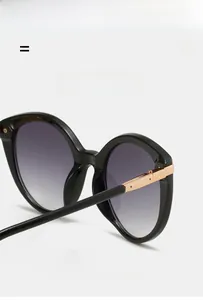 Detailed top view of fashionable oversized sunglasses with elastic frames and gold accents