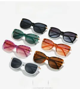Detailed collection of cat eye sunglasses in seven colors with gold hinge accents
