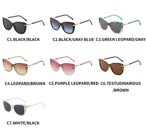 Detail view of colorful cat eye sunglasses collection with stylish metal hinge accents