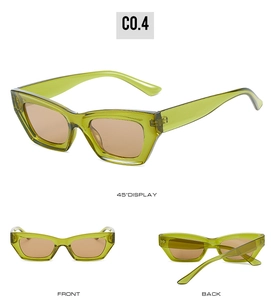 Vues détaillées de lunettes de soleil œil de chat vert translucide avec verres marrons
