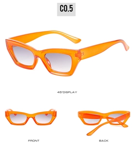 Vues multiples de lunettes de soleil œil de chat orange vif avec verres dégradés