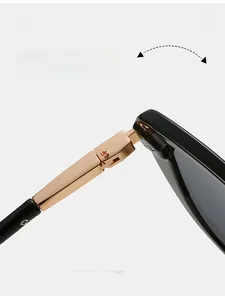 Detailed macro view of durable rose gold metal hinges on stylish cat eye sunglasses