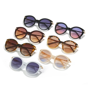 Chic oversized round sunglasses in multiple gradient colors for stylish face framing