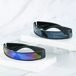 Futuristic cyberpunk shield sunglasses with black frames and iridescent lenses on marble