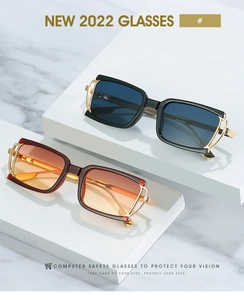 Detailed view of oversized square sunglasses with gradient lenses and metal temple accents
