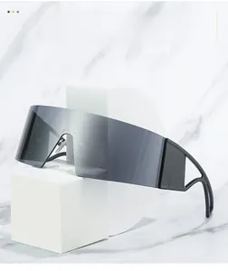 Macro shot of futuristic oversized grey wraparound sunglasses on white geometric pedestals