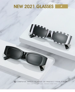 Detail view of retro rectangle sunglasses in black and striped print on white platforms