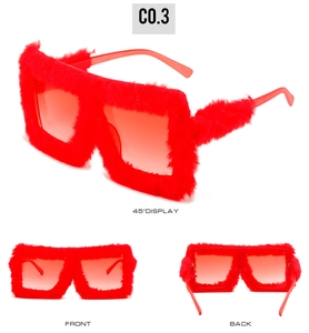 Three-way display of fuzzy red cat eye sunglasses with furry texture and square frame