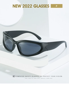 Sleek black Y2K steampunk sport sunglasses displayed on modern white geometric stand