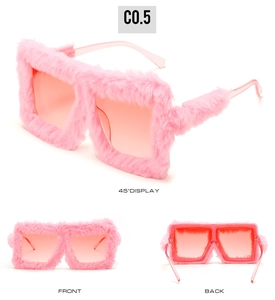 Three-view display of pink faux fur cat-eye sunglasses with gradient lenses