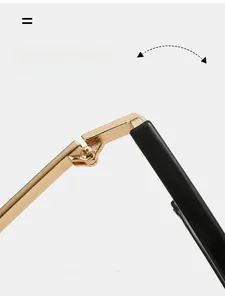 Close-up of durable golden metal hinges and black frame on designer sunglasses