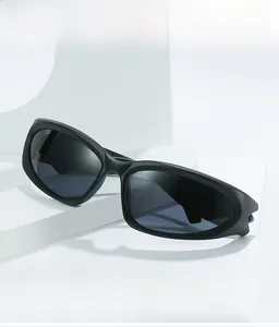 Sleek black steampunk sports sunglasses with streamlined frames on geometric stairs