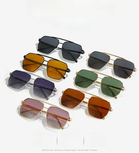 Flat lay of aviator sunglasses set with double bridge and multiple lens color options