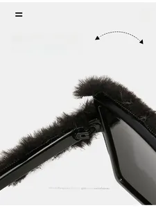 Detail of durable textured hinge on cat eye sunglasses with black faux fur trim