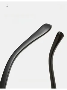 Detail of ergonomic curved mirror legs on plush cat-eye sunglasses for comfortable wear