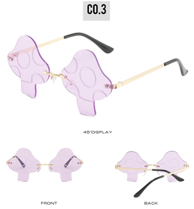 Detail view of mushroom shaped rimless sunglasses with purple lenses and gold metal temples