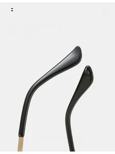 Detail of curved metal temples with ergonomic black tips for flame sunglasses