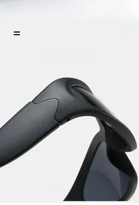 Macro detail of matte black steampunk sunglasses frame with flexible and elastic hinges