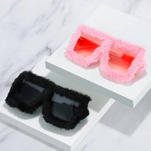 Chic cat eye plush sunglasses in pink and black faux fur for fashionable women